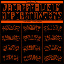 Load image into Gallery viewer, Custom Black Orange Side Panel Abstract Lines Authentic City Edition Basketball Jersey