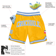 Load image into Gallery viewer, Custom Gold Light Blue-White Authentic Throwback Basketball Shorts
