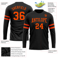 Load image into Gallery viewer, Custom Black Orange Long Sleeve Performance T-Shirt
