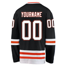 Load image into Gallery viewer, Custom Black White-Orange Hockey Jersey
